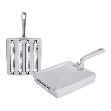 Metallic kitchen brush and scrubber on a white background