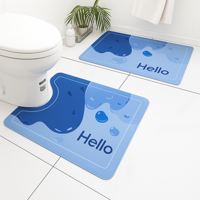Blue ocean-themed anti-slip bathroom mats set, featuring a water design with 'Hello' text, placed next to a toilet.
