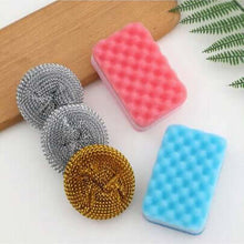 Load image into Gallery viewer, Set of cleaning products including scrubs and a sponge on a white surface with a wooden board and green leaves in the background.
