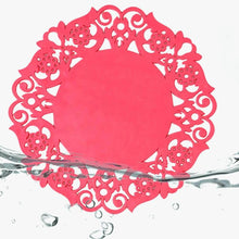Load image into Gallery viewer, Pink decorative paper doily with intricate cut-out patterns on a white background
