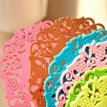 Load image into Gallery viewer, Set of colorful decorative coasters with intricate patterns on a beige background
