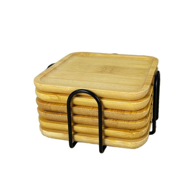Stack of bamboo coasters with a black holder on a white background
