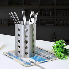 تحميل الصورة في عارض المعرض، Metal utensil holder with cutlery on a kitchen counter

