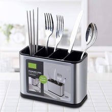 تحميل الصورة في عارض المعرض، Silver cutlery holder with forks, knives, and spoons on a white surface.
