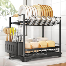 Load image into Gallery viewer, Black dish drying rack with plates, glasses, and utensils on a kitchen counter.
