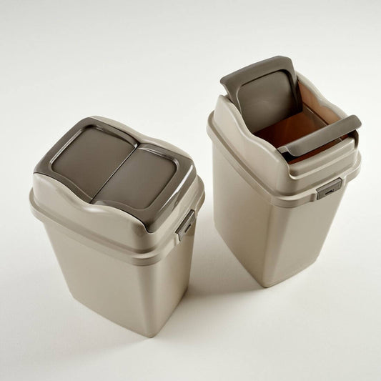 Two beige trash bins with brown lids on a white background