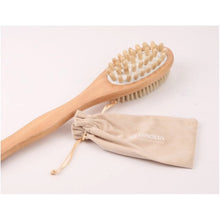 تحميل الصورة في عارض المعرض، Wooden brush with natural bristles and a matching drawstring bag on a light background

