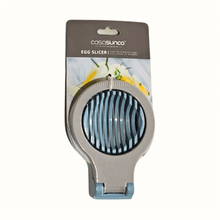 Load image into Gallery viewer, A multifunctional egg slicer and cutter packaged on a card, with visible stainless steel wires for slicing.
