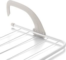 Load image into Gallery viewer, White metal towel rack with a hook on a white background
