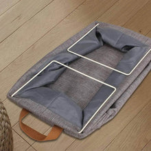 Load image into Gallery viewer, Folded fabric storage box showing its metal frame
