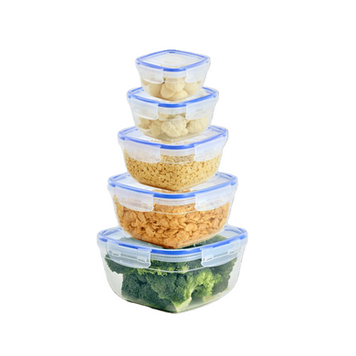 A set of five stacked square food storage containers with blue lids, filled with rice, pasta, and vegetables, demonstrating their various capacities.