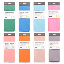 Load image into Gallery viewer, Packaged sports towels in various colors with labels on a white background
