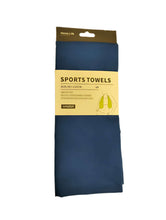 Load image into Gallery viewer, Packaged sports towel with a yellow label on a white background

