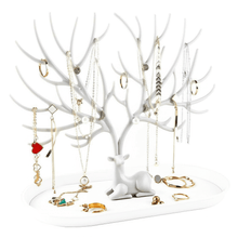 Load image into Gallery viewer, White deer-shaped jewelry organizer stand with necklaces, earrings, and rings for stylish vanity decor.
