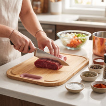 تحميل الصورة في عارض المعرض، Dual-Sided Bamboo Cutting Board with Silicone Handle (36x25.5cm) | Wooden Chopping Board &amp; Kitchen Prep Station
