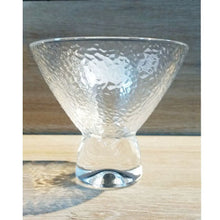 Load image into Gallery viewer, Clear glass bowl with textured surface on a wooden surface
