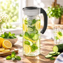 Load image into Gallery viewer, Elegant 1.5 L glass jug with built-in infuser for flavored water, perfect for stylish hydration in any kitchen or dining area.
