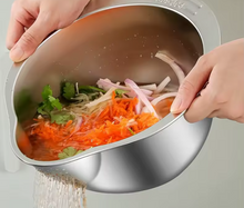 تحميل الصورة في عارض المعرض، Hands holding a stainless steel multifunction bowl with vegetables, demonstrating easy washing and draining.
