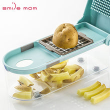 Load image into Gallery viewer, 3 Blades Vegetables Slicer | Professional Manual Chopper in use with potatoes being sliced.
