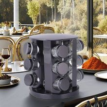 Load image into Gallery viewer, Shakers - 360° Black Rotating 12 Jars Spice Storage Rack - Stainless Steel Tower for Kitchen Cabinet Organizer on a dining table.
