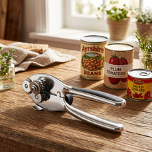 Load image into Gallery viewer, Heavy-duty stainless steel can opener with ergonomic non-slip handle for easy use.
