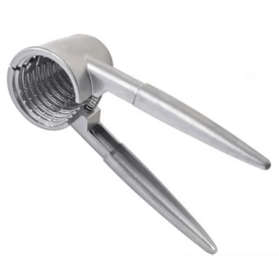 A silver stainless steel nut crusher with a hand crank handle.