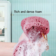Load image into Gallery viewer, A pink porous sponge covered in thick white foam, with text reading 'Rich and dense foam' over a bathroom tile background.
