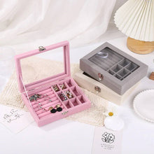 Load image into Gallery viewer, Pink jewelry box with earrings on a white surface
