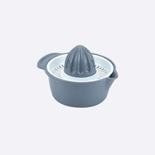 تحميل الصورة في عارض المعرض، Gray manual juicer on a light gray background
