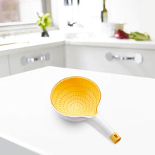تحميل الصورة في عارض المعرض، Yellow colander on a white kitchen counter
