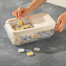 Load image into Gallery viewer, A large clear plastic storage container with a slide lid, being held by a person. The container is filled with small, sealed packages of rice, and there are a few additional packages visible outside the container.
