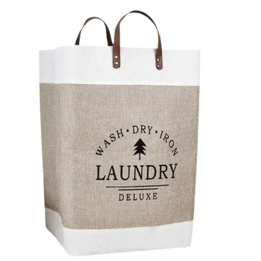 A laundry bag with beige and brown colors, featuring leather handles and the text 'WASH • DRY • IRON • LAUNDRY • DELUXE' printed on the front.