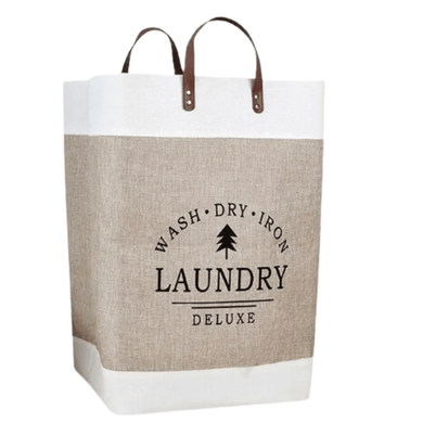 A laundry bag with beige and brown colors, featuring leather handles and the text 'WASH • DRY • IRON • LAUNDRY • DELUXE' printed on the front.