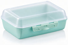 Load image into Gallery viewer, A mint green plastic lunch box with a hinged lid and three latch buttons on the front, shown on a white background with a soft reflection.
