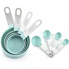 Load image into Gallery viewer, Set of teal measuring cups and spoons with silver handles on a white background
