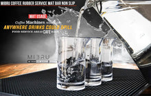 Load image into Gallery viewer, MIBRU rubber service mat with water being poured into glasses on a counter.

