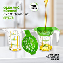 Load image into Gallery viewer, A 500 ml oil strainer jug set by Tizit, featuring a clear plastic container with green lid and a separate green strainer scoop, shown with olive oil being poured into it on a light kitchen counter background.
