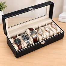 Load image into Gallery viewer, Black watch box with six watches on a wooden surface
