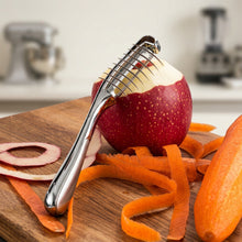Load image into Gallery viewer, Apple peeler with peeled apple and carrot on a wooden board
