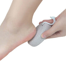 Load image into Gallery viewer, Person using a pumice stone on their foot against a white background
