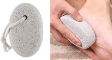 Load image into Gallery viewer, Pumice stone being used on a foot with a white background
