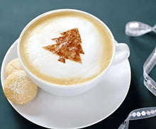 Load image into Gallery viewer, Cappuccino with a Christmas tree design in foam, served with cookies on a dark surface.
