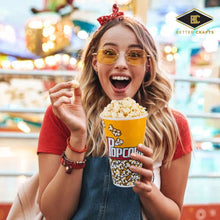 Load image into Gallery viewer, Plastic Popcorn Container Retro Style | Small Reusable Popcorn Buckets filled with popcorn in a smiling young woman's hands.
