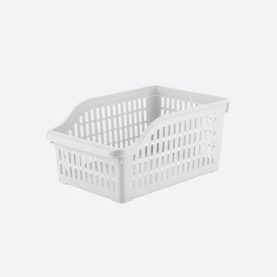 White storage basket on a light gray background
