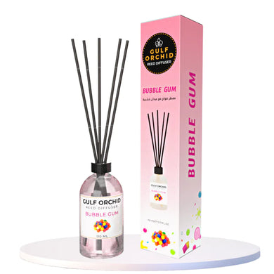 Gulf Orchid bubble gum scented reed diffuser with packaging on a white background