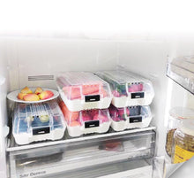 Load image into Gallery viewer, Fridge with organized food storage containers labeled &#39;dunya&#39;.
