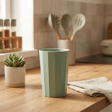 Load image into Gallery viewer, Decorative vase with dried flowers and a green cylindrical vase on a wooden surface.
