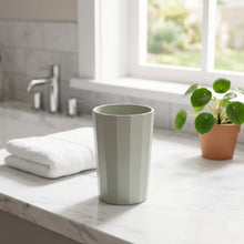 Load image into Gallery viewer, Light gray plastic cup with ribbed texture on a white background
