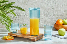 Load image into Gallery viewer, Set of colorful glasses with a pitcher on a wooden tray against a light background
