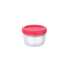 Load image into Gallery viewer, A small clear plastic storage container with a bright pink lid, shown on a plain white background.

